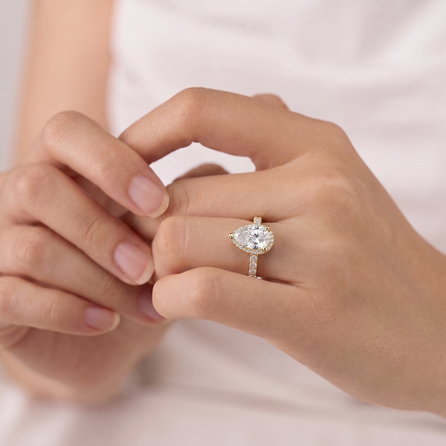 1.5 Carat Pear-Cut Moissanite Diamond Engagement Ring with Pavé Band
