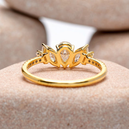 0.70 Carat Pear Cut Moissanite Diamond Three Stone Engagement Ring
