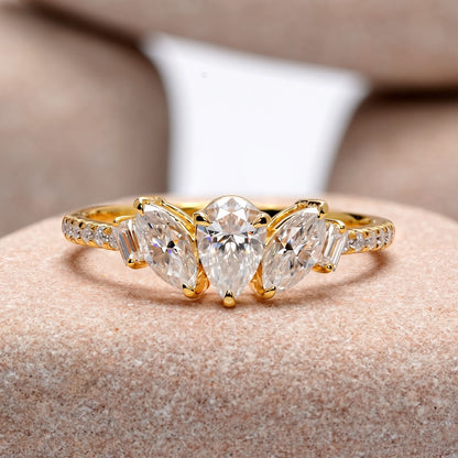 0.70 Carat Pear Cut Moissanite Diamond Three Stone Engagement Ring