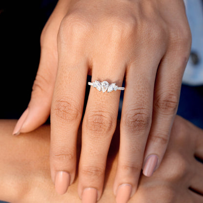 0.70 Carat Pear Cut Moissanite Diamond Three Stone Engagement Ring