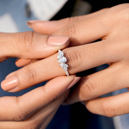 0.70 Carat Pear Cut Moissanite Diamond Three Stone Engagement Ring