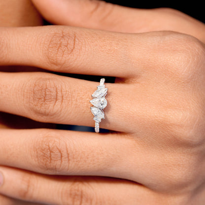 0.70 Carat Pear Cut Moissanite Diamond Three Stone Engagement Ring