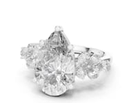 6 Carat Pear Cut Diamond Engagement Ring with Floral Side Accents